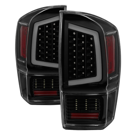 xTune 16-18 Toyota Tacoma Light Bar LED Tail Lights - Black Smoked (ALT-JH-TTA16-LBLED-BSM) 9041693
